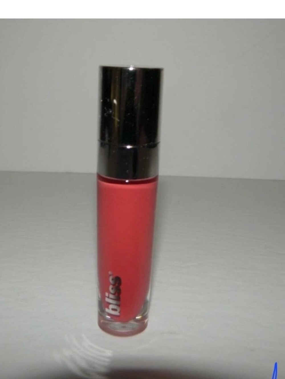BLISS Bold Over Long Wear Liquefied Lipstick in CANDY CORAL KISSES (Full Size)